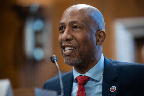 Man Speaking at a Mic