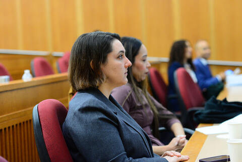 People sitting at a desk 
