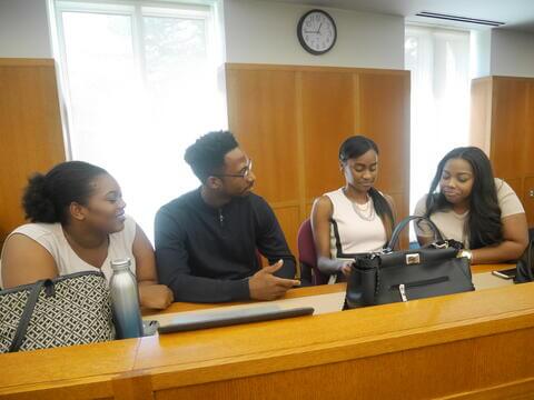 Women sitting in courtroom